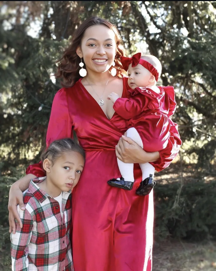 Mother with two children outdoors